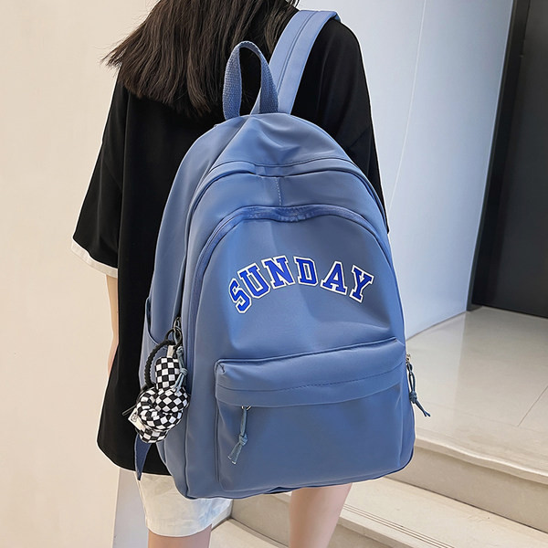 Muški ležerni ruksak s natpisom i privjeskom za ključeve