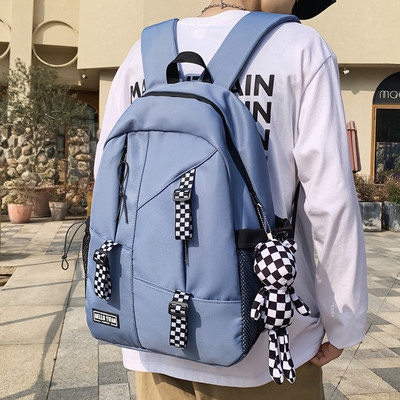 Pánsky ležérny batoh so zapínaním na zips a nápisom