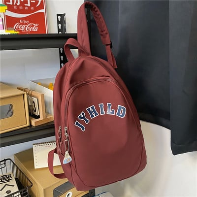 Rucsac casual pentru bărbați cu inscripție și element 3D