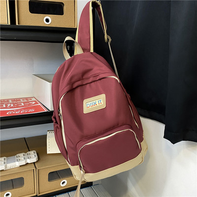 Muški moderan ruksak s logotipom i patentnim zatvaračem