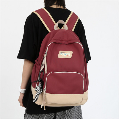 Muški moderan ruksak s logotipom i patentnim zatvaračem