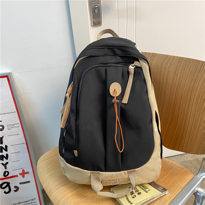 Rucsac textil cu multe compartimente in multe culori