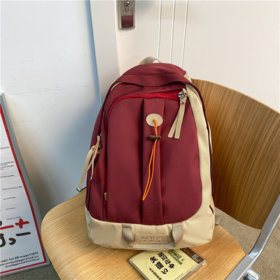 Rucsac textil cu multe compartimente in multe culori