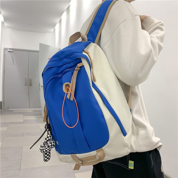 Rucsac textil cu multe compartimente in multe culori