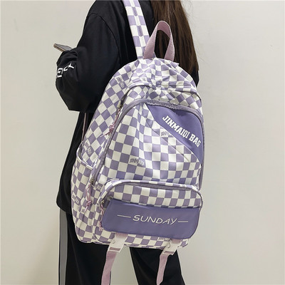 Pánsky batoh s figúrkami a nápisom