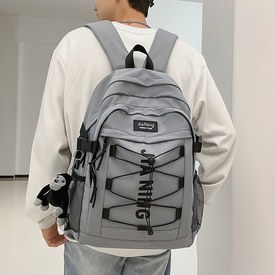 Nový model textilného batohu so šnúrkami a nápisom pre mužov