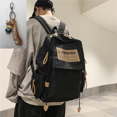 Textilný batoh s vreckami a širokými popruhmi