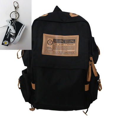 Textilný batoh s vreckami a širokými popruhmi