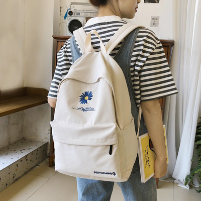 Pánsky batoh s nápisom a širokými popruhmi