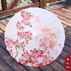 Naiste vihmavari Siidist õues Jaapani kirsiõied iidse tantsu pulma dekoratiivne vihmavari Hiina stiilis õlipaberist vihmavari