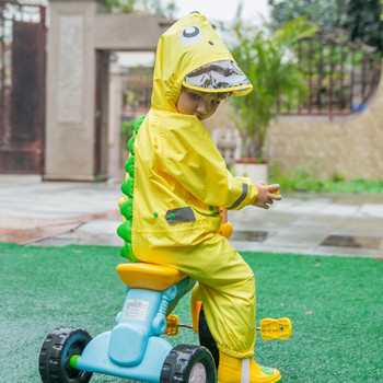 Παιδιά 2-9 ετών Μοντέρνα αδιάβροχη ολόσωμη φόρμα αδιάβροχο με κουκούλα κινούμενα σχέδια Dinosaur Kids One-Pece Rain Coat Baby Tour Rain Gear
