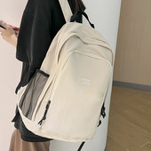 Pánsky ležérny textilný batoh s nápisom a bočnými vreckami