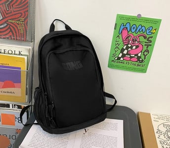 Pánsky ležérny textilný batoh s nápisom a bočnými vreckami