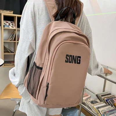 Pánsky ležérny textilný batoh s nápisom a bočnými vreckami