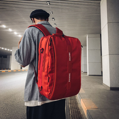 Įprasta vyriška kuprinė su dideliais skyriais