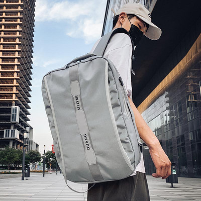 Įprasta vyriška kuprinė su dideliais skyriais