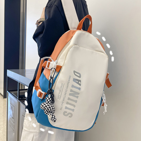 Didelė, kelių spalvų tekstilinė kuprinė vyrams