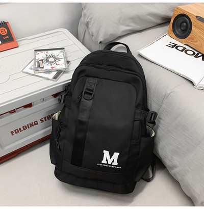 Tekstilni ruksak s više pretinaca - unisex model