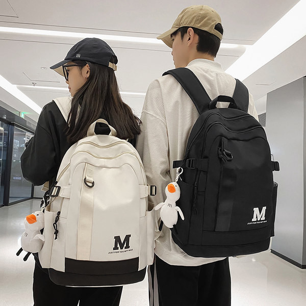 Tekstilni ruksak s više pretinaca - unisex model