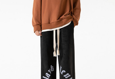 Pánske nohavice širokého modelu s nápisom