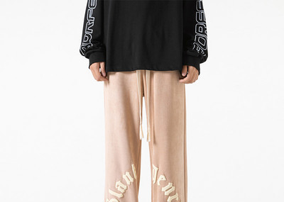 Pánske nohavice širokého modelu s nápisom