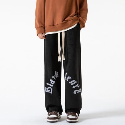 Pánske nohavice širokého modelu s nápisom