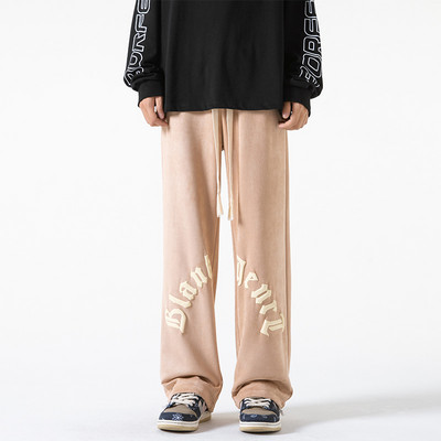 Pánske nohavice širokého modelu s nápisom