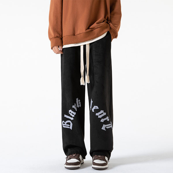 Pánske nohavice širokého modelu s nápisom