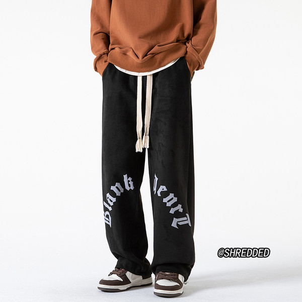 Pánske nohavice širokého modelu s nápisom