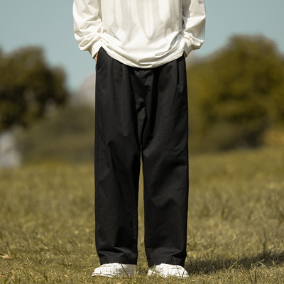 Pantaloni largi pentru bărbați de culoare neagră și bej