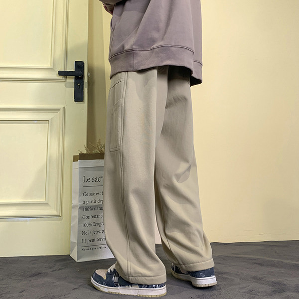 Pánske nohavice širokého modelu s vreckom