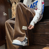 Pánske manšestrové nohavice s rozparkami na nohaviciach a logom