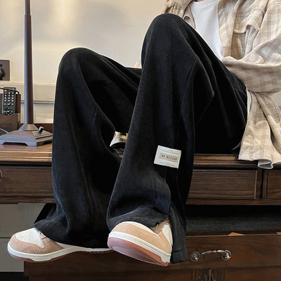 Pánske manšestrové nohavice s rozparkami na nohaviciach a logom