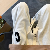 Pánske tepláky s výšivkou