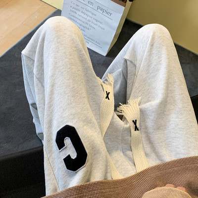 Pánske tepláky s výšivkou