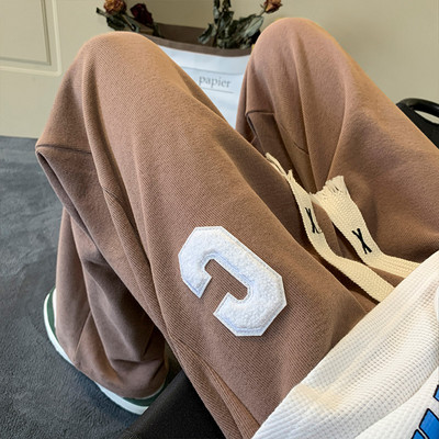 Pánske tepláky s výšivkou