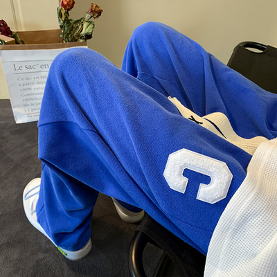 Pánske tepláky s výšivkou