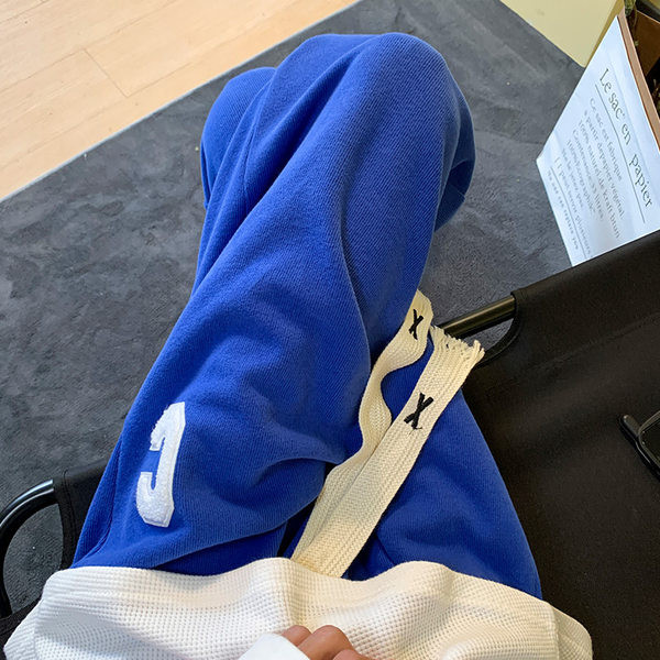 Pánske tepláky s výšivkou