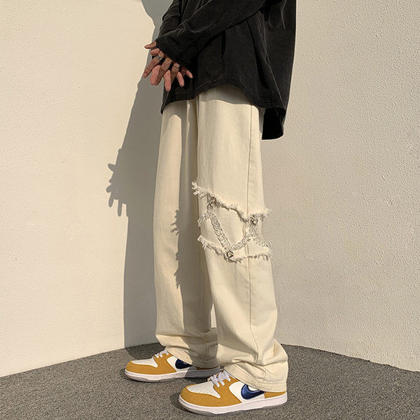 Muške hlače s džepom i poderanim motivima