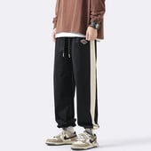 Pantaloni de trening pentru bărbați cu legături la picioare și logo