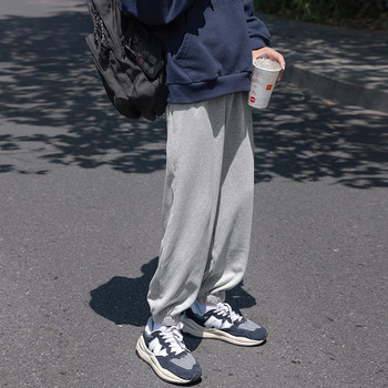 Мъжки спортен панталон с ластик на крачолите и джоб