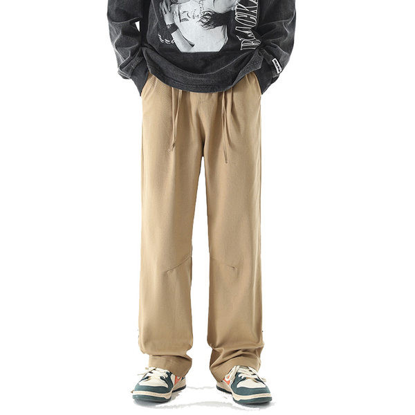 Nový model pánskych nohavíc s vysokým pásom a gombíkmi na nohaviciach