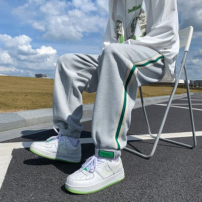 Pantaloni sport barbati cu margini