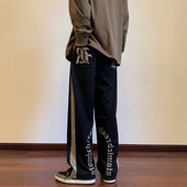 Pánske nohavice s lemovaním a nápisom