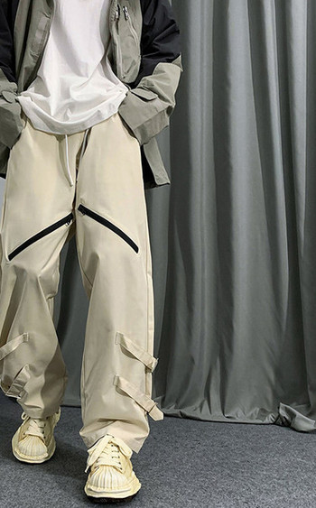 Ανδρικό μοντέρνο παντελόνι με μεταλλικό στοιχείο και κορδόνια