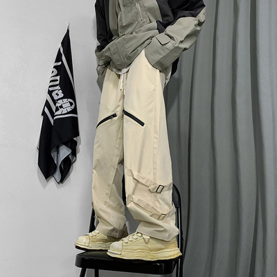 Pantaloni moderni pentru barbati cu element metalic si sireturi