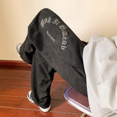 Nový model pánskych športových nohavíc s nápisom