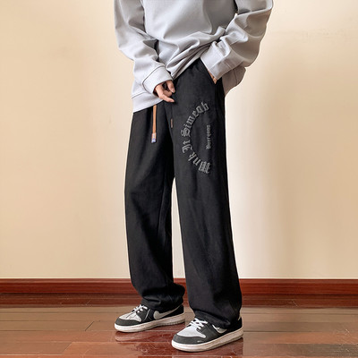 Nový model pánskych športových nohavíc s nápisom