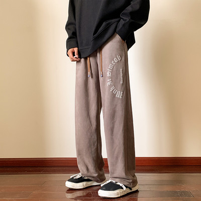 Nový model pánskych športových nohavíc s nápisom