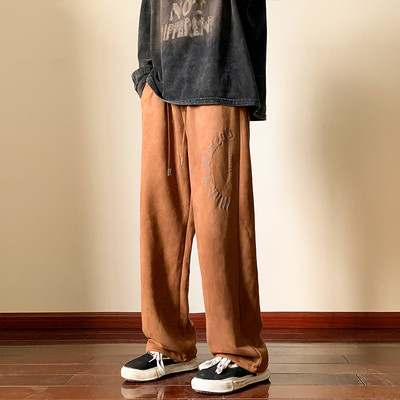 Nový model pánskych športových nohavíc s nápisom